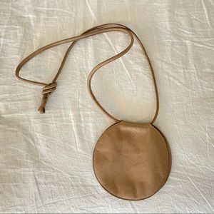 ARE Studio circular crossbody folding bag dust